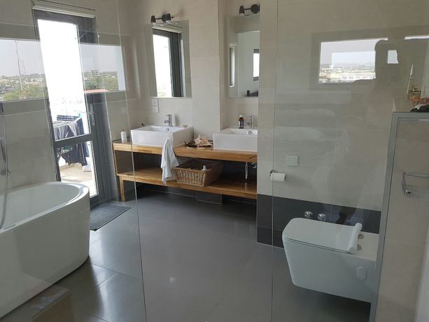 Imagen de la habitación del Hotel Suncity Apartments. Foto 6
