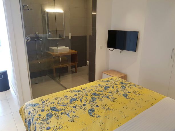 Imagen de la habitación del Hotel Suncity Apartments. Foto 8