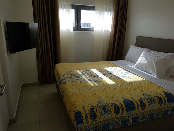 Imagen de la habitación del Hotel Suncity Apartments. Foto 13