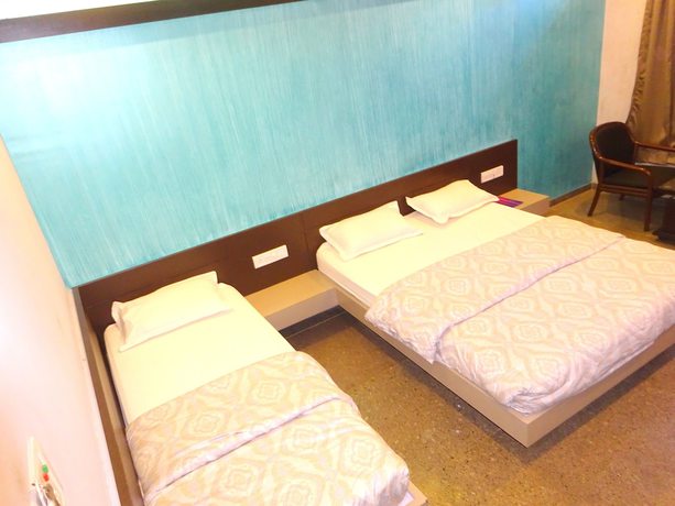 Imagen de la habitación del Hotel Suncity Cottage. Foto 5