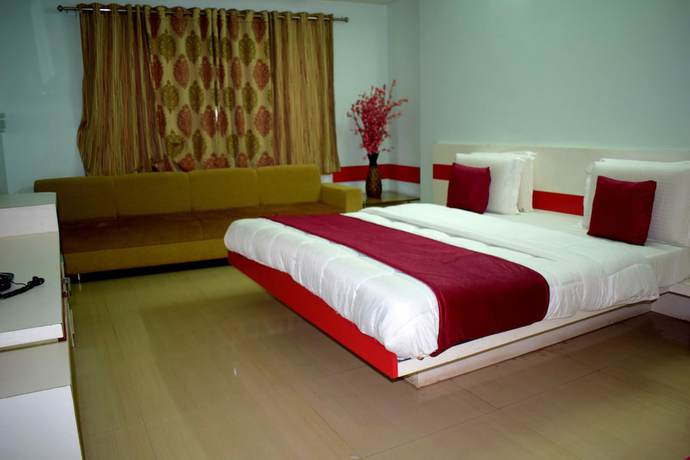 Imagen de la habitación del Hotel Suncity Cottage. Foto 6