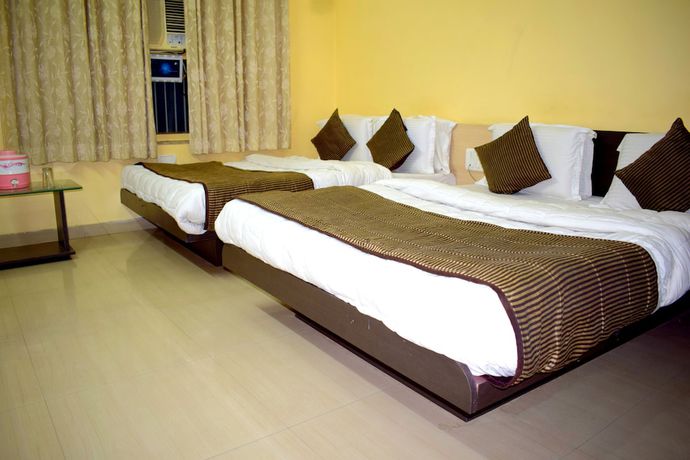 Imagen de la habitación del Hotel Suncity Cottage. Foto 7