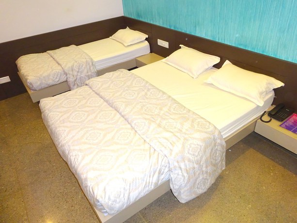 Imagen de la habitación del Hotel Suncity Cottage. Foto 10