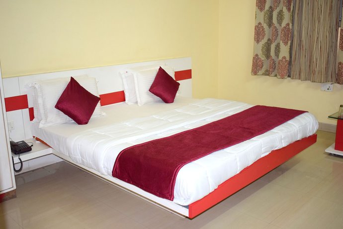 Imagen de la habitación del Hotel Suncity Cottage. Foto 11