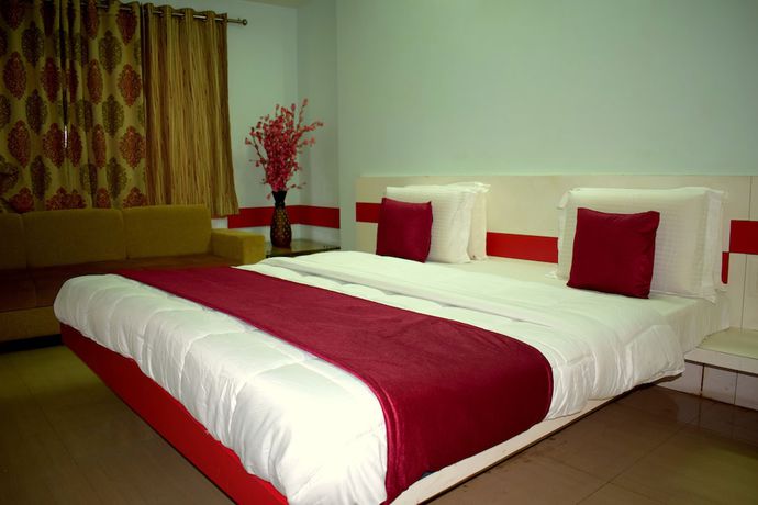 Imagen de la habitación del Hotel Suncity Cottage. Foto 13