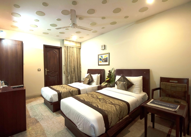 Imagen de la habitación del Hotel Suncity. Foto 10