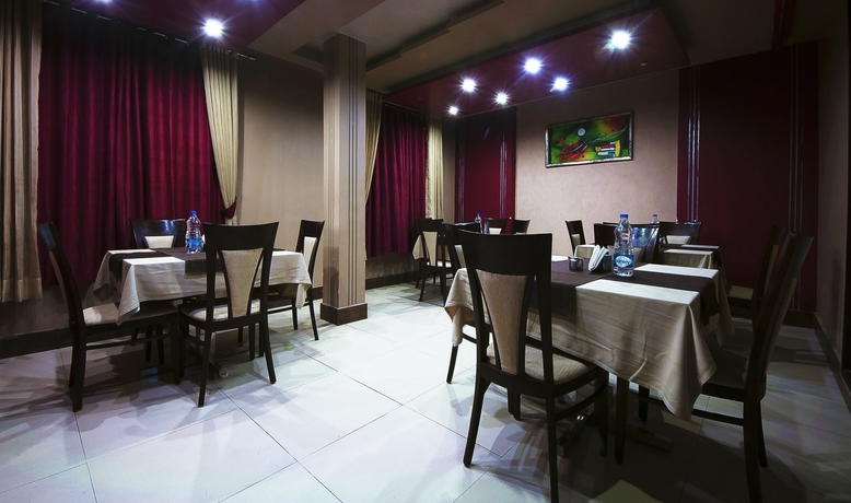 Imagen del bar/restaurante del Hotel Suncity. Foto 3