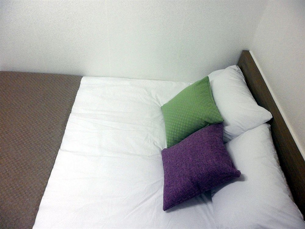 Imagen de la habitación del Hotel Suncity Guest House. Foto 8