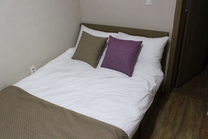 Imagen de la habitación del Hotel Suncity Guest House. Foto 9