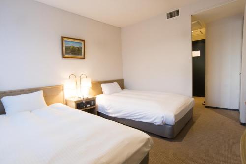 Imagen de la habitación del Hotel Suncrest. Foto 8