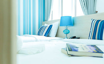 Imagen de la habitación del Hotel Sunday Beachfront View Jomtien Pattaya. Foto 6
