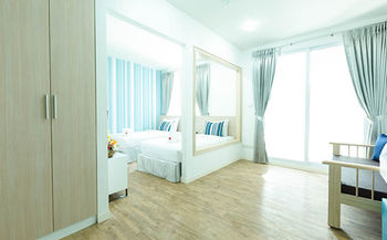 Imagen de la habitación del Hotel Sunday Beachfront View Jomtien Pattaya. Foto 7