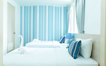 Imagen de la habitación del Hotel Sunday Beachfront View Jomtien Pattaya. Foto 8