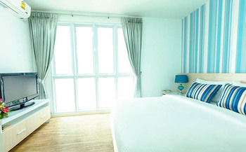 Imagen de la habitación del Hotel Sunday Beachfront View Jomtien Pattaya. Foto 9