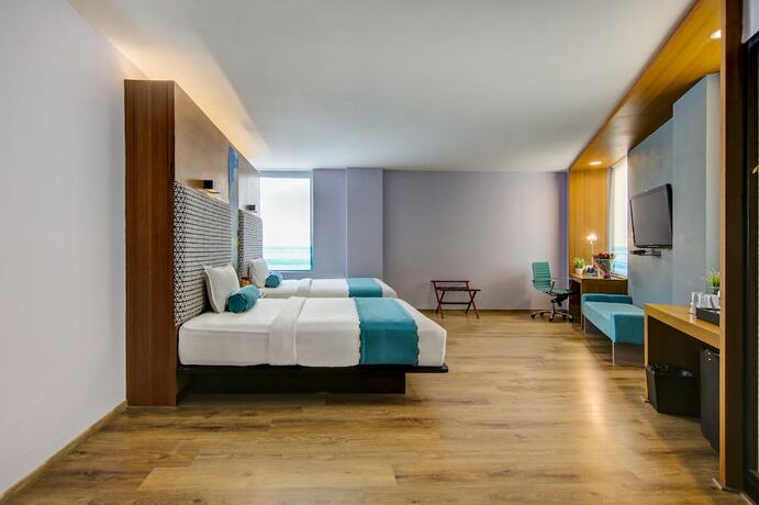Imagen de la habitación del Hotel Sunday Chandigarh Zirakpur. Foto 21