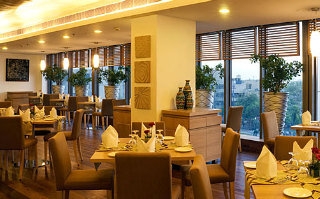 Imagen del bar/restaurante del Hotel Sunday Hotel by CheckIn Jaipur. Foto 8