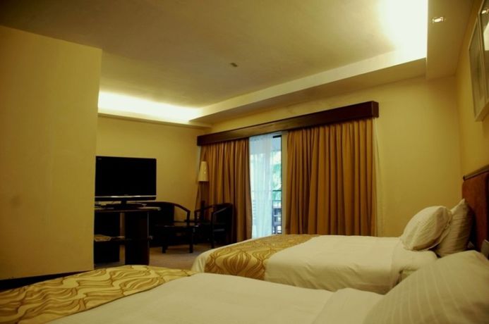 Imagen de la habitación del Hotel Sunday Residence Inn Cherating. Foto 11
