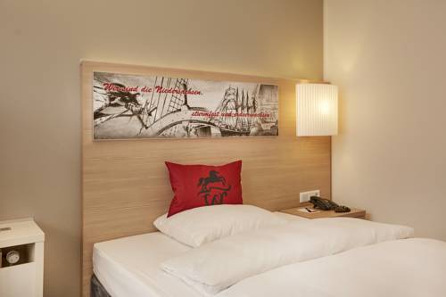 Imagen de la habitación del Hotel Sunday Stade Herzog Widukind. Foto 11