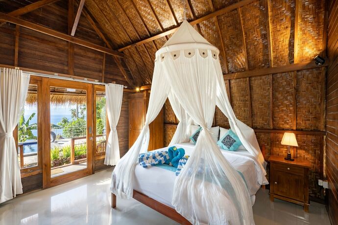 Imagen de la habitación del Hotel Sundi Ocean Bungalow By Abm. Foto 19