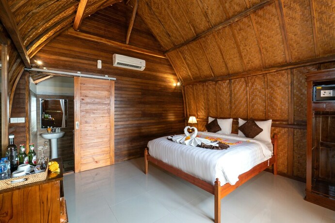 Imagen de la habitación del Hotel Sundi Ocean Bungalow By Abm. Foto 25