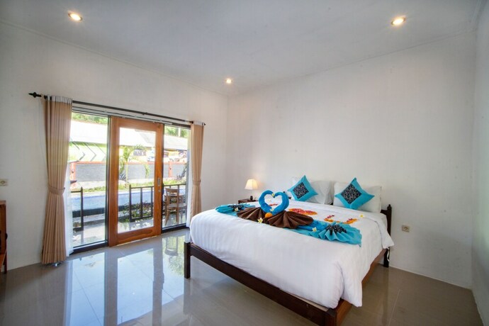 Imagen de la habitación del Hotel Sundi Ocean Bungalow By Abm. Foto 26