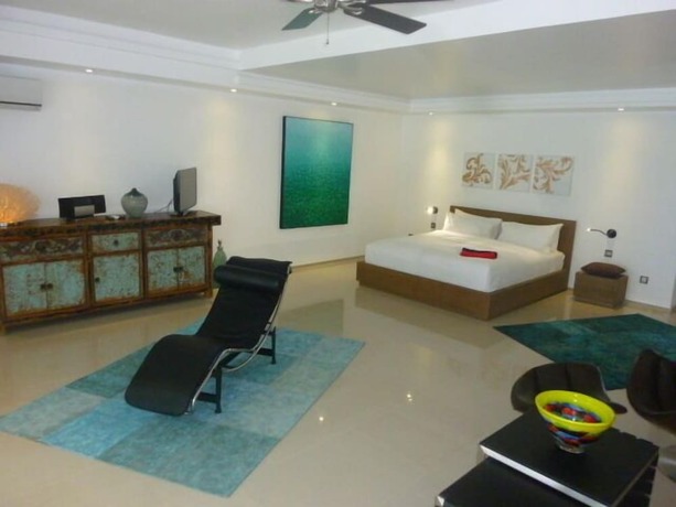 Imagen de la habitación del Hotel Sundown Beach Studios. Foto 18