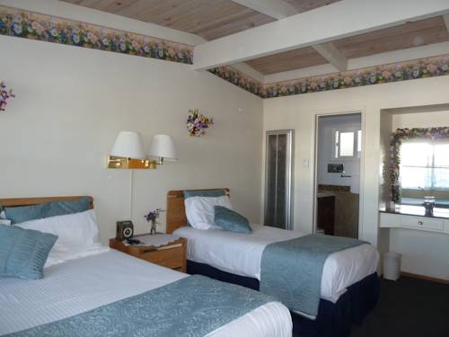 Imagen de la habitación del Hotel Sundown Inn. Foto 11