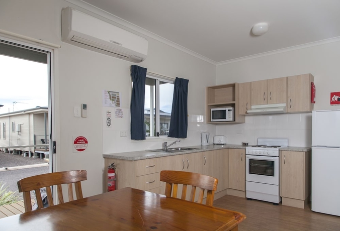 Imagen de la habitación del Hotel Sundowner Cabin and Tourist Park. Foto 6