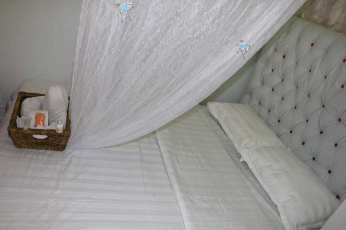 Imagen de la habitación del Hotel Sundowns And Apartments Millimani. Foto 19