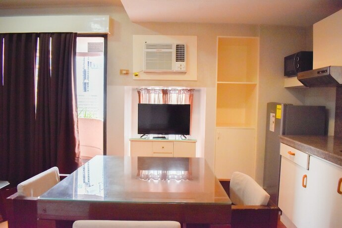 Imagen de la habitación del Hotel Sunette Condo Suite. Foto 15