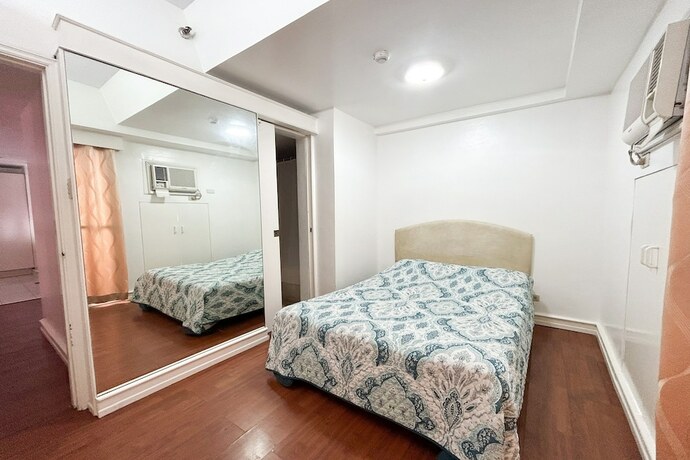 Imagen de la habitación del Hotel Sunette Condo Suite. Foto 17