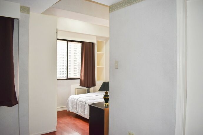 Imagen de la habitación del Hotel Sunette Condo Suite. Foto 19