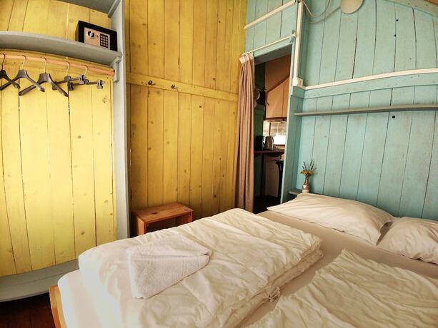 Imagen de la habitación del Hotel Sunflower Camping. Foto 18