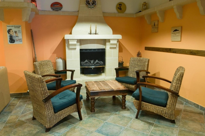 Imagen del bar/restaurante del Hotel Sunflower, QAWRA. Foto 2