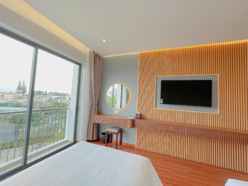 Imagen de la habitación del Hotel Sunflower & Resort. Foto 13