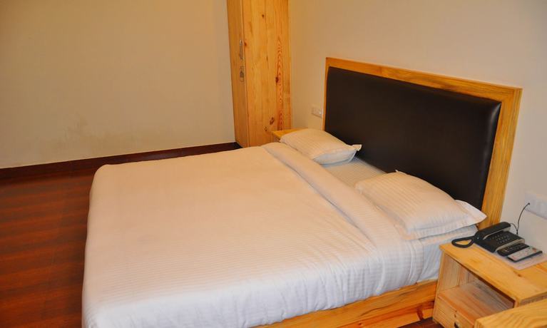 Imagen de la habitación del Hotel Sungrace Mussorie. Foto 18