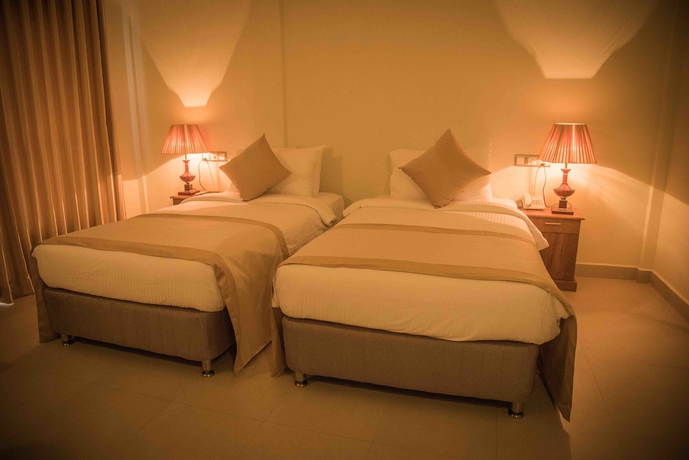 Imagen de la habitación del Hotel Sungreen Resort and Spa. Foto 3