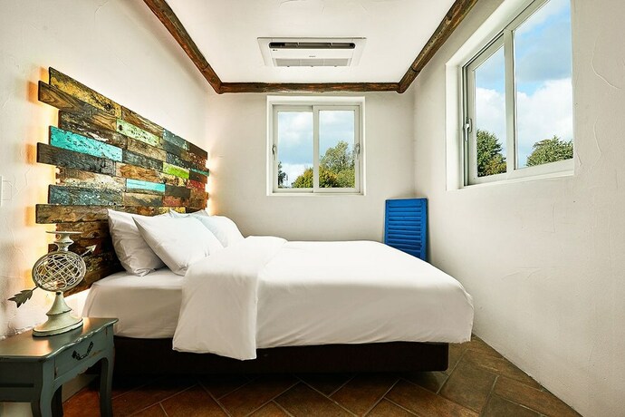 Imagen de la habitación del Hotel Sungsan Paradise Hill. Foto 25