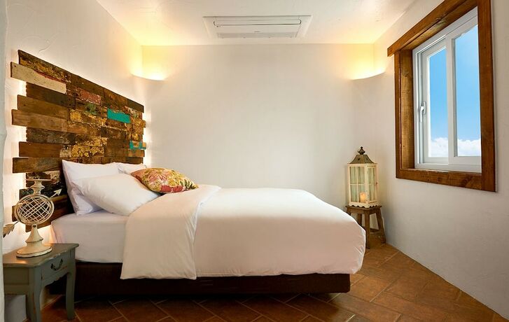 Imagen de la habitación del Hotel Sungsan Paradise Hill. Foto 32