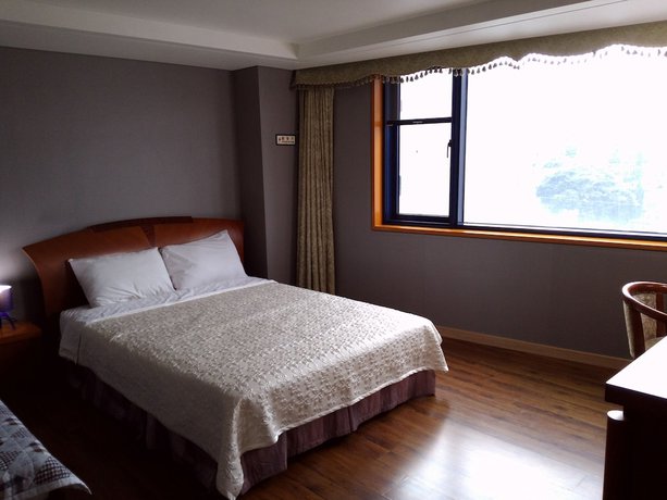 Imagen de la habitación del Hotel Sungsanpo Sky. Foto 6