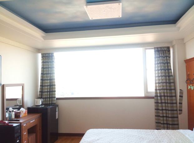 Imagen de la habitación del Hotel Sungsanpo Sky. Foto 12