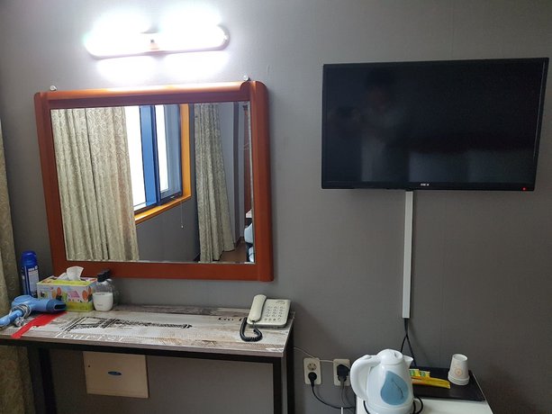 Imagen de la habitación del Hotel Sungsanpo Sky. Foto 15