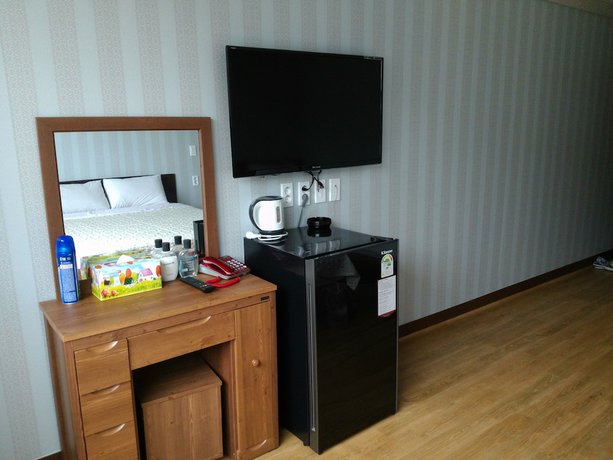 Imagen de la habitación del Hotel Sungsanpo Sky. Foto 17