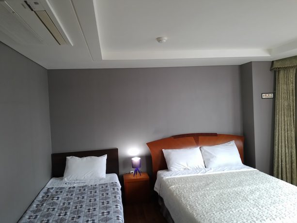 Imagen de la habitación del Hotel Sungsanpo Sky. Foto 18
