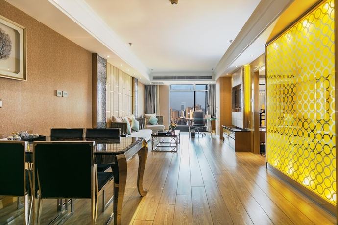 Imagen de la habitación del Hotel Suning Universal Hotel. Foto 8