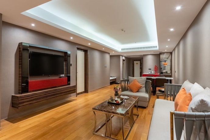 Imagen de la habitación del Hotel Suning Universal Hotel. Foto 9