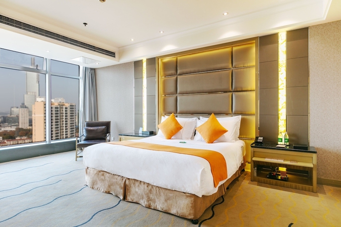 Imagen de la habitación del Hotel Suning Universal Hotel. Foto 13