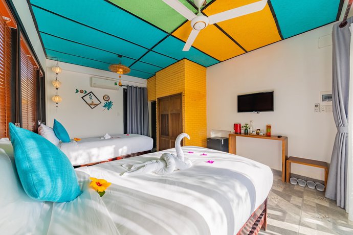 Imagen de la habitación del Hotel Sunkissed Paddy Hoi An Villa. Foto 7