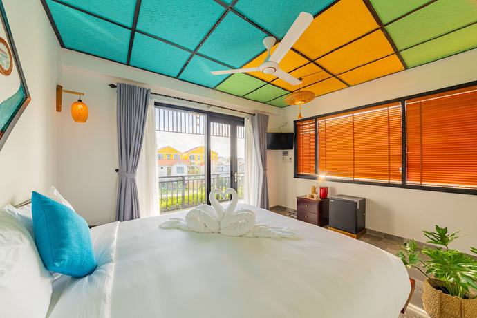 Imagen de la habitación del Hotel Sunkissed Paddy Hoi An Villa. Foto 12