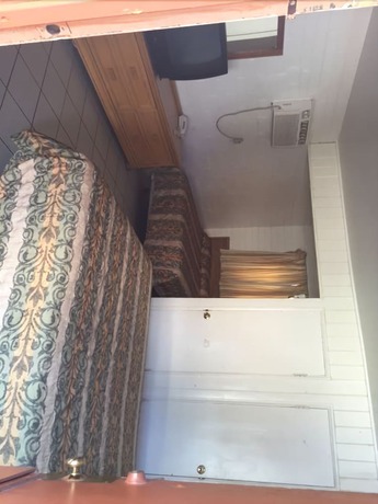 Imagen de la habitación del Hotel Sunland Motel. Foto 3